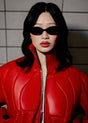 Model wearing MENINA NOIR rounded oval acetate eyewear in black